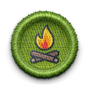 badge with a campfire
